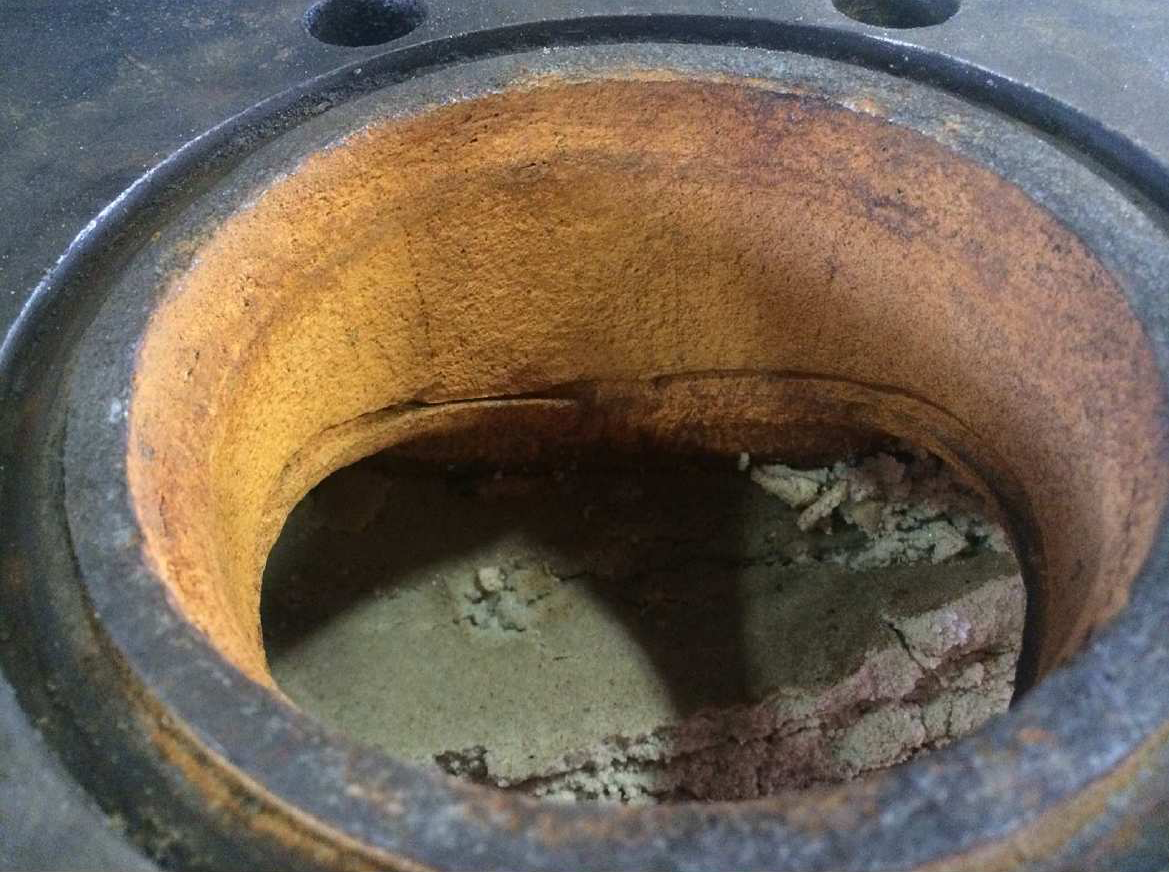 Fluid End Packed with Sand